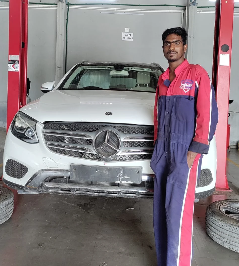 Professional mechanic working on a car